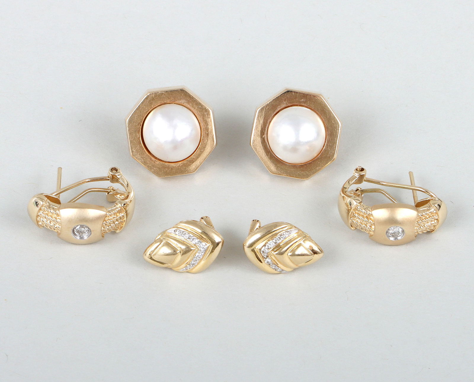 Group of (3) Pairs of 14k Gold French-Clip Earrings: Group of (3) Pairs of 14k Gold French-Clip Earringsto include: diamond and rope twist pair, having shaped gold pieces over gold rope twists, each earring with a round-cut diamond, approximately 0.1 ca