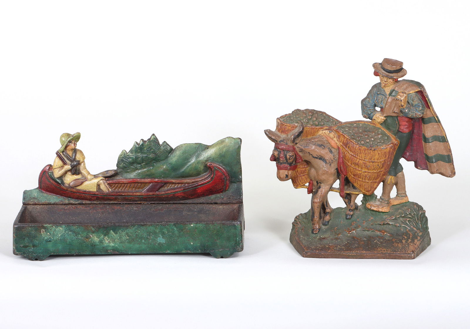 Poinsettia Doorstop: Poinsettia Doorstoppainted cast iron, probably no. 1268 by Judd Co., no mark visible.9 3/4 x 4 3/4 x 2 3/4 in. (24.8 x 12.1 x 7 cm.)