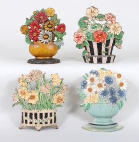 Group of (4) Hubley Flower Doorstops