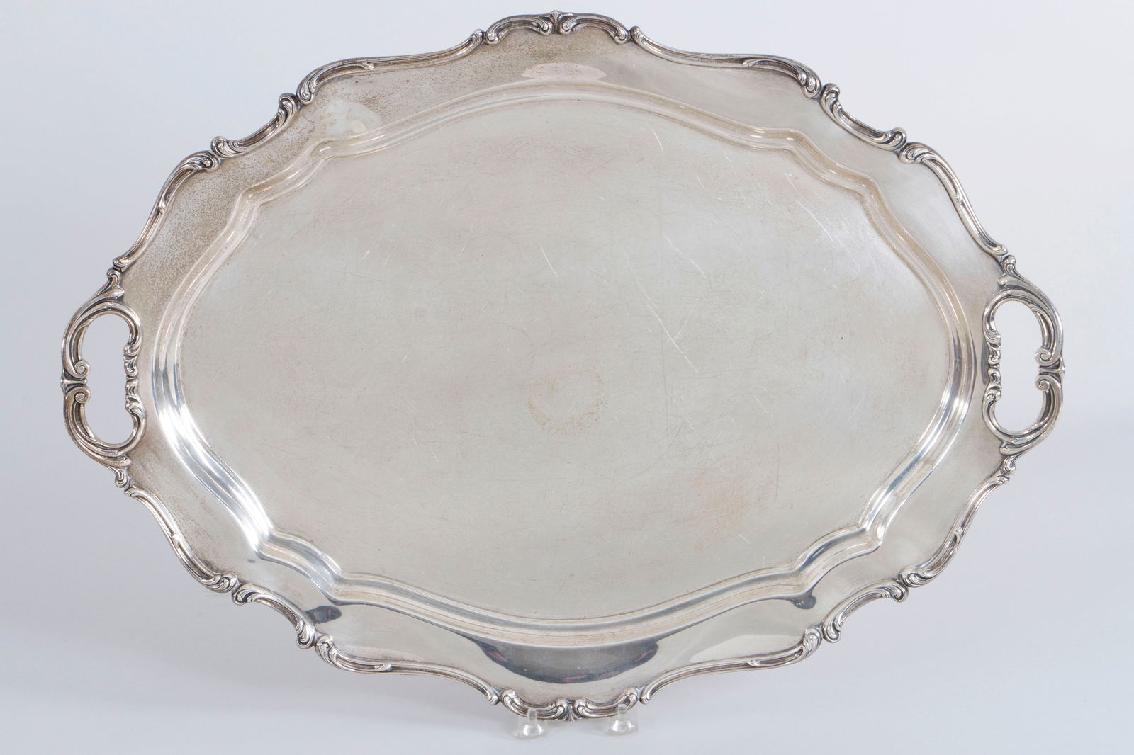 Reed & Barton Large Sterling Silver Serving Tray: Reed & Barton Large Sterling Silver Serving Traypossibly in the Spanish Baroque pattern, 1953, marked on bottom.24 3/8 x 17 5/8 x 2 1/8 in. (61.9 x 44.8 x 5.4 cm.); approximate weight 102.9 troy oz.
