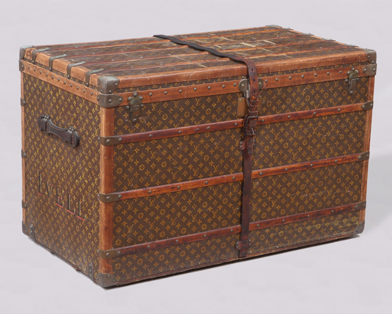 Louis Vuitton Steamer Trunk: Louis Vuitton Steamer Trunkwith classic monogram, brass and wood bound with brass hardware, leather handles and strap, interior with large pull-out basket, stamped serial number 197521 and paper label