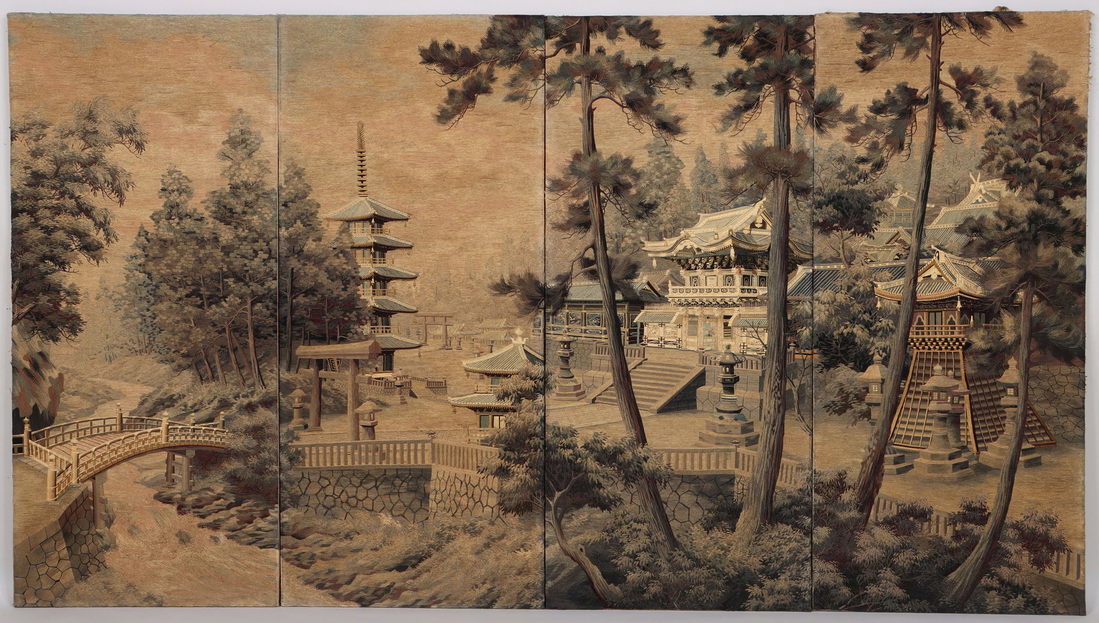 Japanese Four-Panel Embroidered Silk Room Screen: Japanese Four-Panel Embroidered Silk Room Screendepicting a bridge leading to a temple in a forest landscape, late Meiji/early 20th century.54 1/2 x 97 1/2 in. (138.4 x 247.7 cm.)