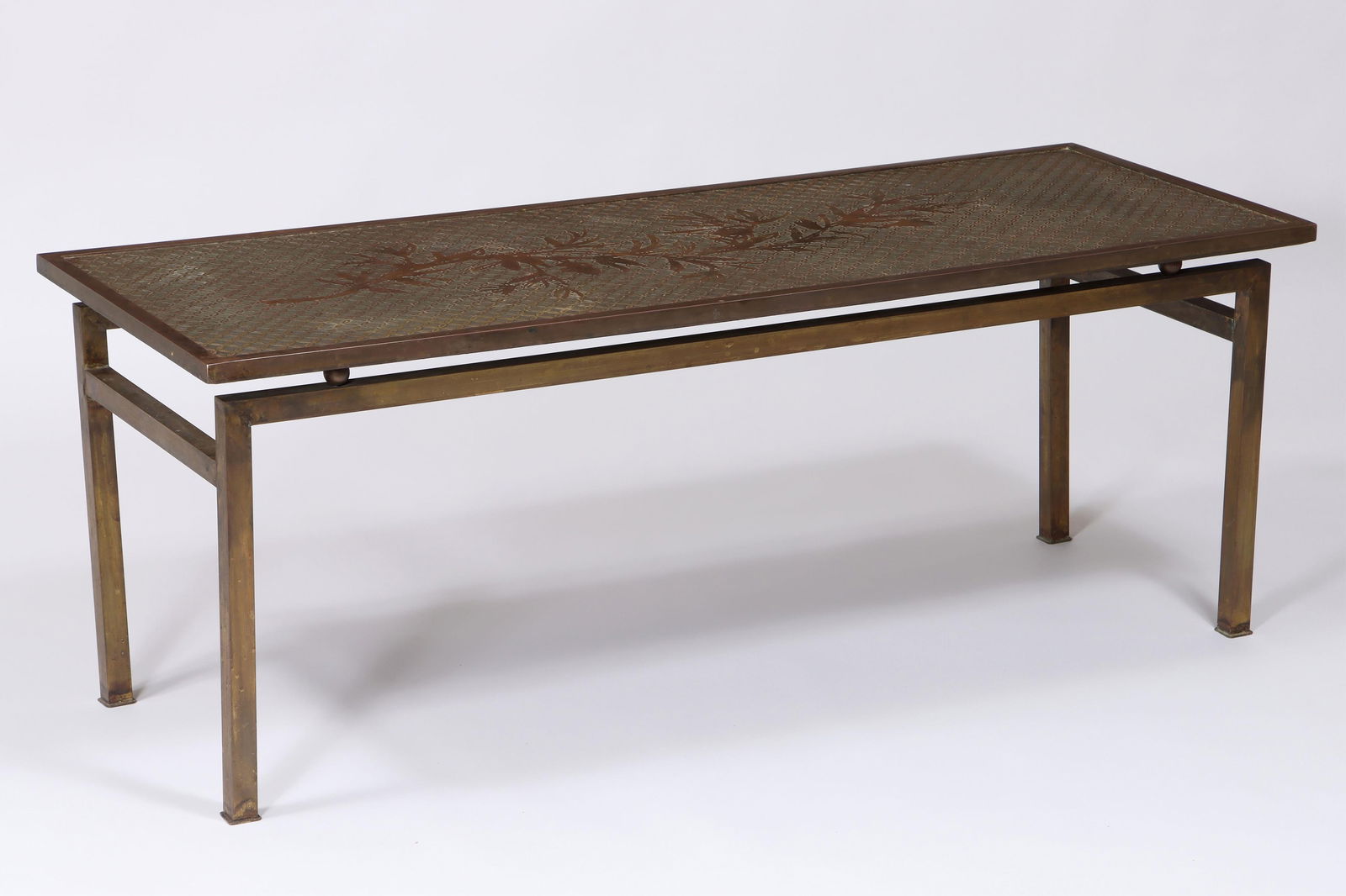 Philip and Kelvin LaVerne "Kuan Su" Coffee Table: Philip and Kelvin LaVerne "Kuan Su" Coffee Tablehaving a rectangular top with etched and patinated bronze and pewter, in an Asian-style design with a flowering branch set against a geometric ground, a