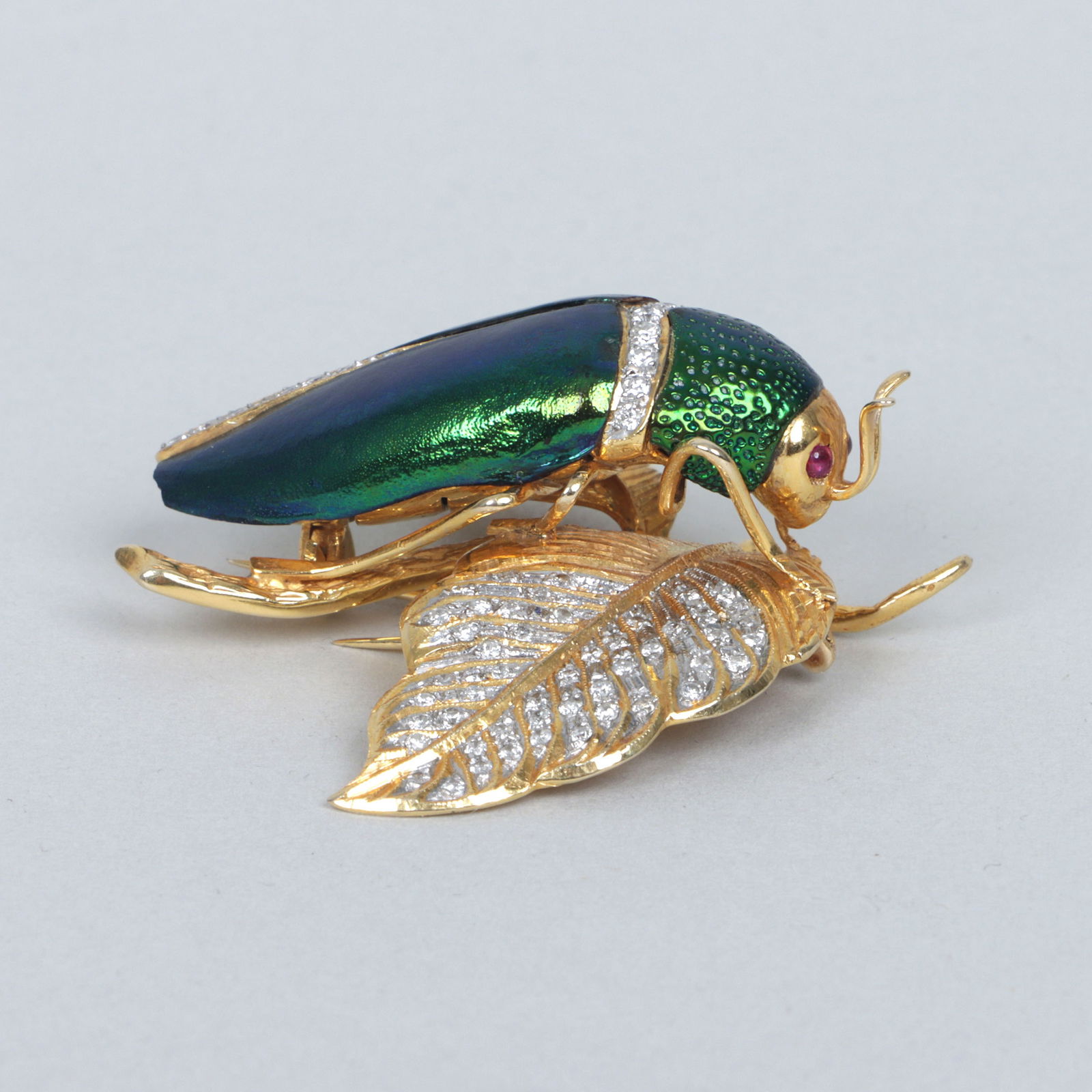 14k Gold Beetle Brooch with Precious Stones: 14k Gold Beetle Brooch with Precious Stoneshaving gold beetle with (2) ruby cabochon eyes, (16) round brilliant-cut diamonds of varying sizes, and real iridescent beetle wings applied to back, perched