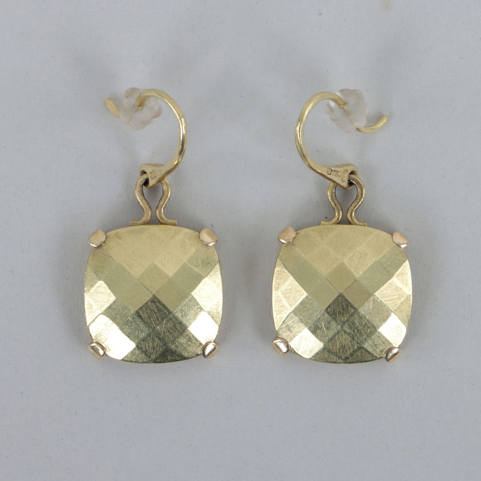 Pair of Bottega Veneta 18k Gold Drop Earrings: Pair of Bottega Veneta 18k Gold Drop Earringswith faceted square cushion-form gold pieces prong-set in gold frames, along with rubber backs, marked on sides of hooks.Total approximate weight 8.8 dwt.