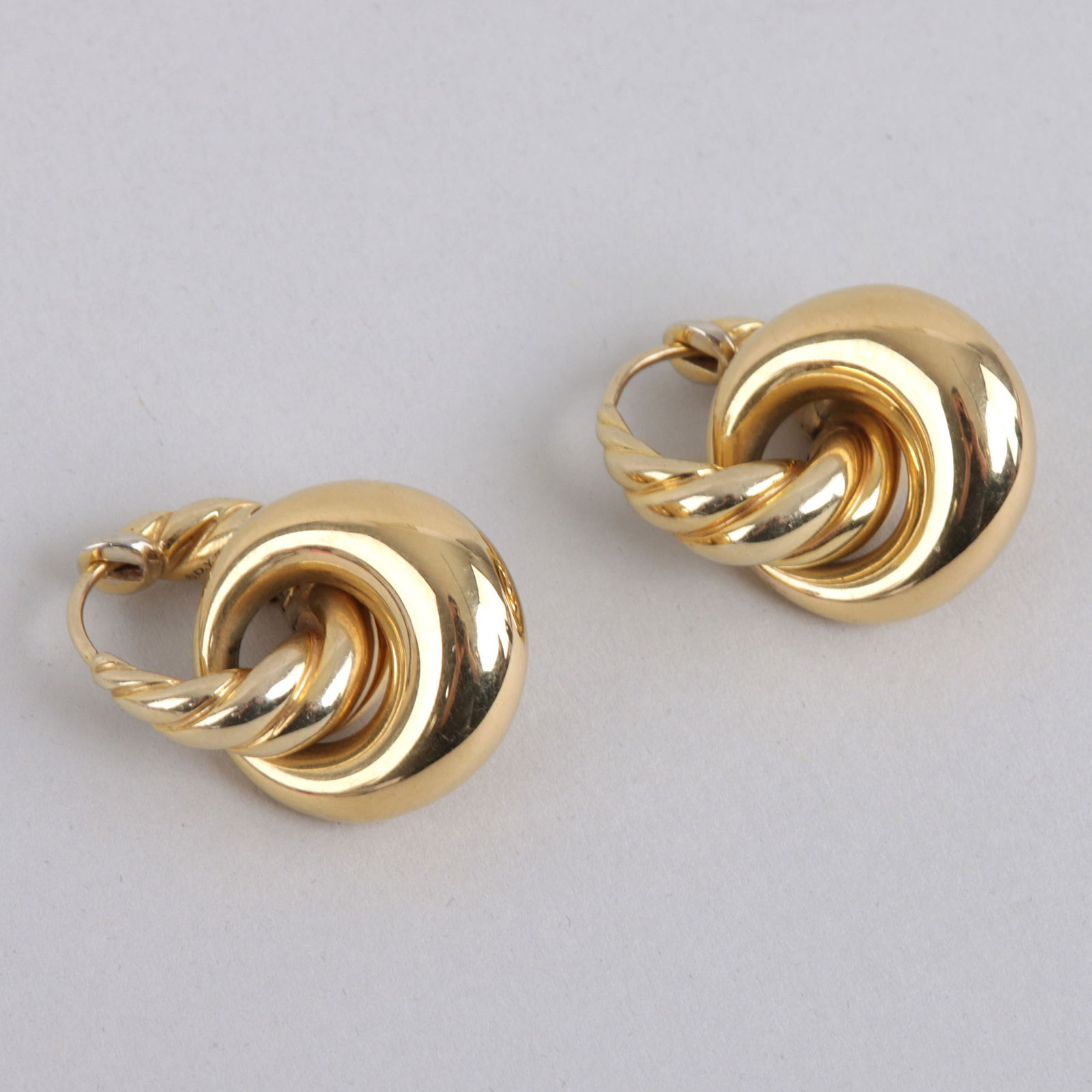 Pair of David Yurman 18k Gold Double Hoop Earrings: Pair of David Yurman 18k Gold Double Hoop Earringshaving "cable" or rope twist hoop earrings with removeable hoop-form drops, signed and marked "750".Total approximate weight 8.3 dwt.