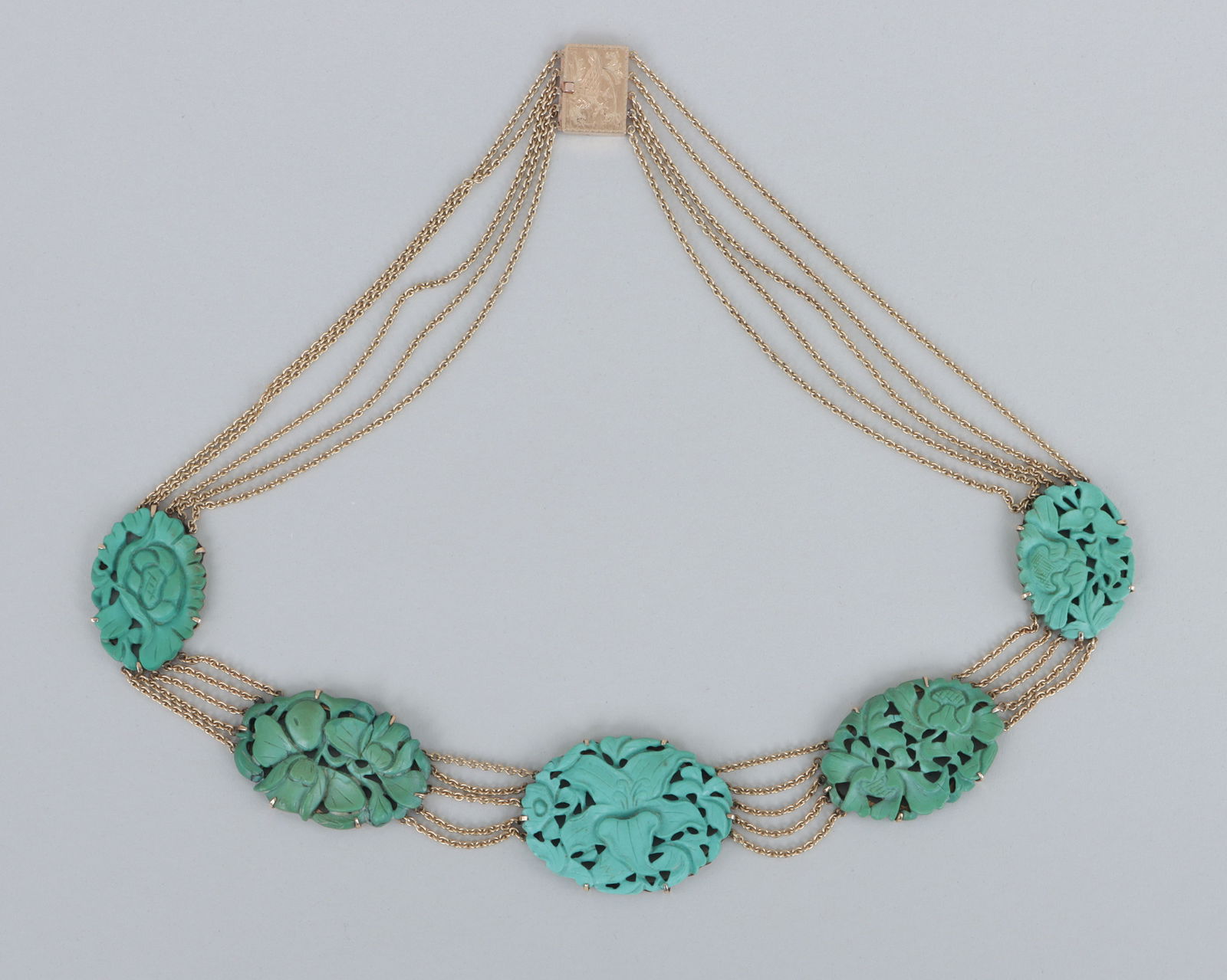 Bensabbott of Chicago 14k Necklace: Bensabbott of Chicago 14k Gold and Carved Turquoise Necklacehaving (5) Chinese carved and pierced turquoise oval medallions with floral design, all prong-set over 14k gold frames and mounted on five c