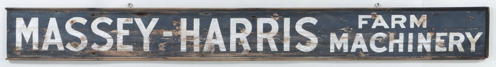 Painted Wood Trade Sign: Large "Massey-Harris Farm Machinery" Painted Wood Trade Sign 13 x 119 x 1 in. (33 x 302.3 x 2.5 cm.)