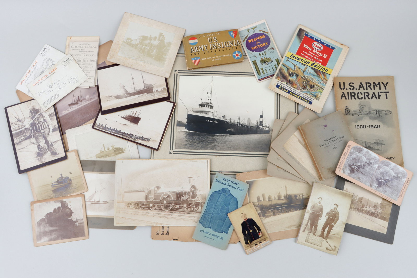 Military, Marine and Railroad Photographs, Books and Ephemera: Collection of (39) Military, Marine and Railroad Photographs, Books and Ephemera To include (23) Photographs, comprising: “L.S. Wescoat” tanker, gelatin silver print by Capt. W.J. Taylor, Mari