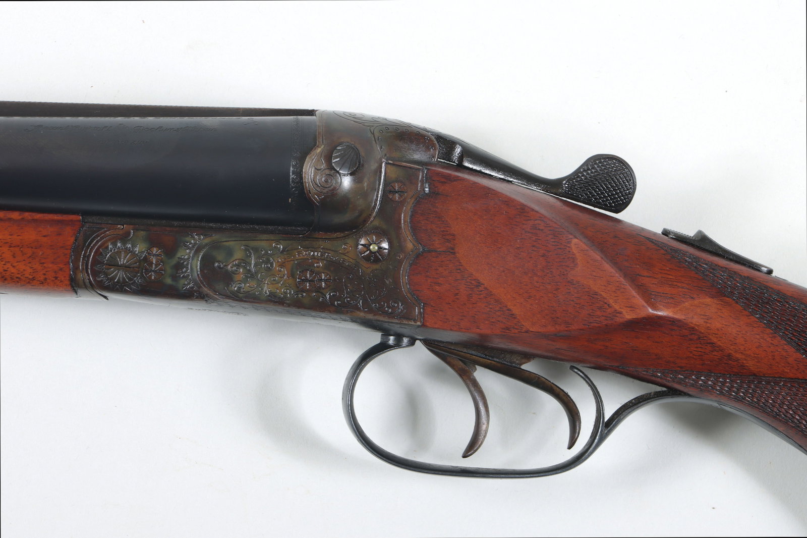 J.P. Sauer & Sohn Boxlock Ejector: J.P. Sauer & Sohn Boxlock Ejector 12 Gauge 2-2/4" The high rib barrels measure 28" and are marked "Half Choke" and "Full" on the flats. The scalloped receiver is case-hardened and lightly engraved wit