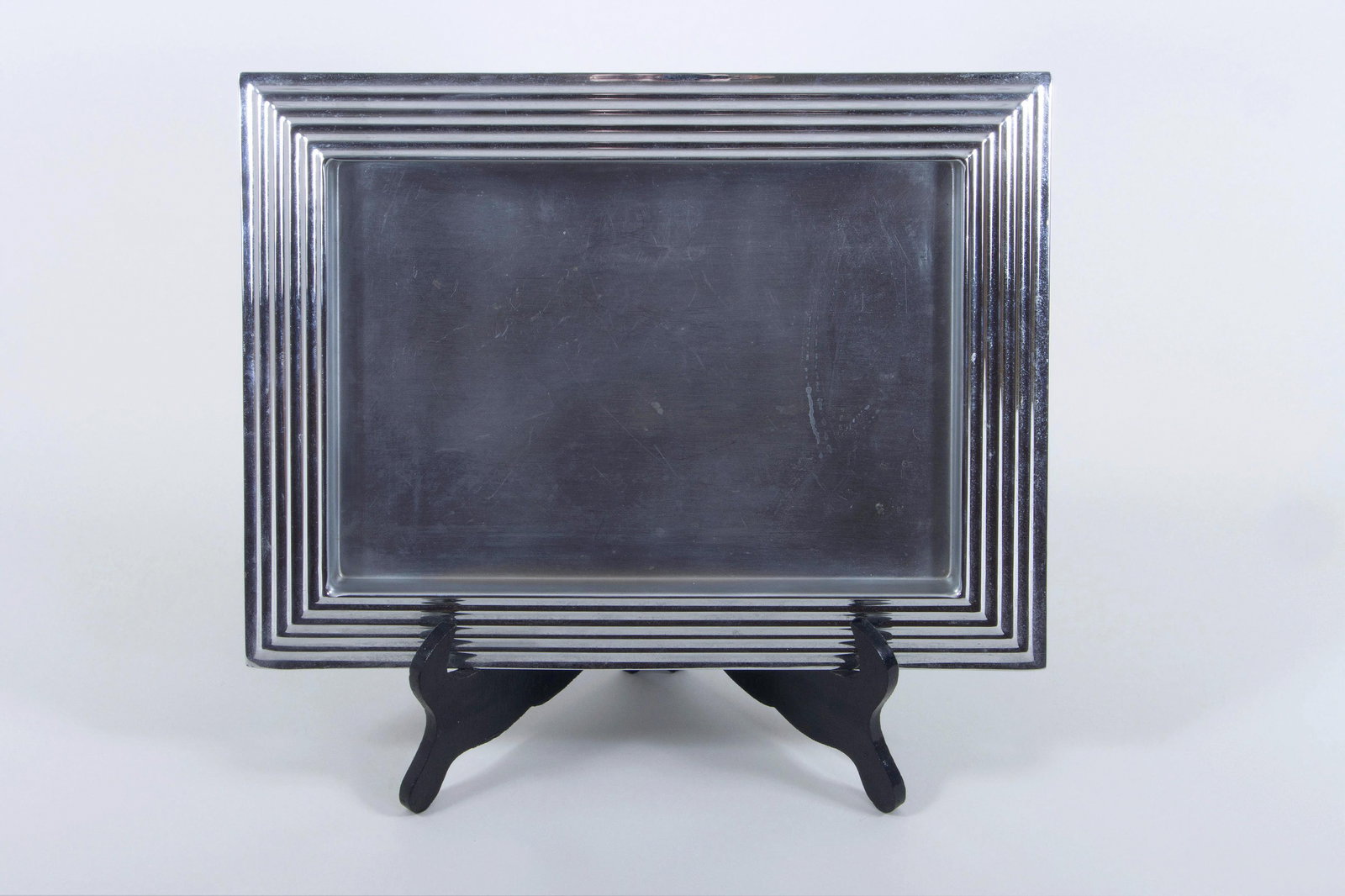 Norman Bel Geddes (American, 1893-1958): Norman Bel Geddes American, 1893-1958 "Manhattan" Art Deco Cocktail Tray chrome-plated metal from the "Manhattan Cocktail Service" collection, c. 1935, with stepped edge, for Revere Copper & Brass Co.