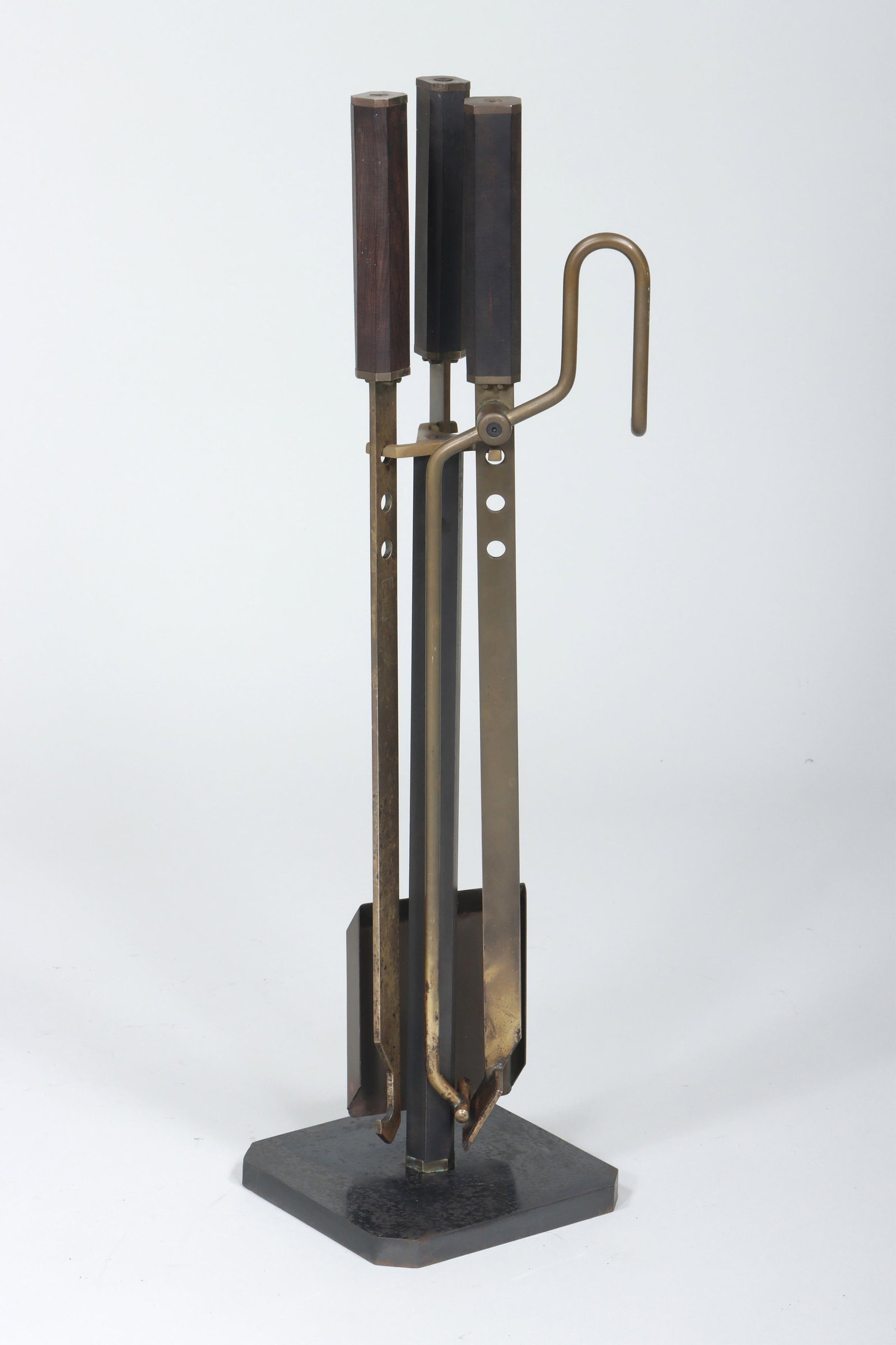 Afra and Tobia Scarpa (Italian, 1937-2011/b. 1935): Afra and Tobia Scarpa (Italian, 1937-2011/b. 1935) for Dimensione Fuoco, Fireplace Tool Set c. 1970s/1980s, having (3) brass tools with pierced bars and octagonal wood handles, comprising shovel, tong