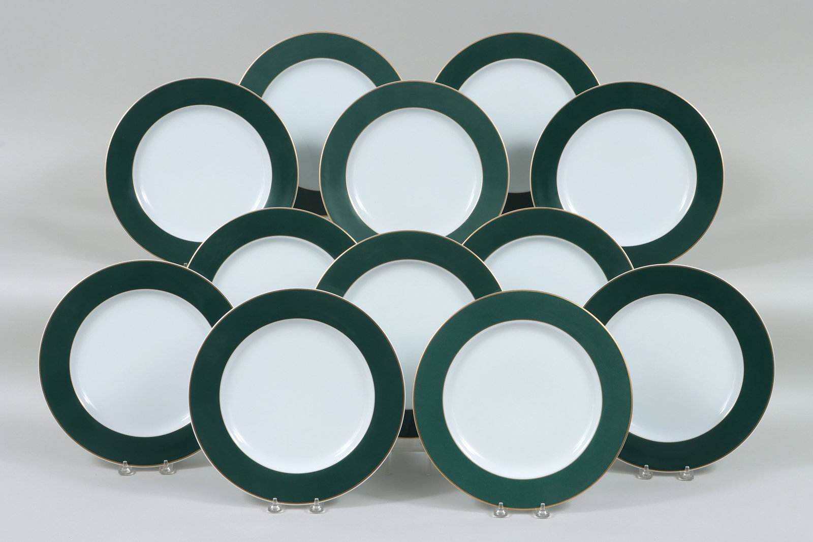 Bernardaud Porcelain Dinner Plates: Set of (12) Bernardaud Porcelain Dinner Plates in the Opaline Vert pattern, having edge with gilt borders, marked. Diameter 11 3/4 in. (29.8 cm.)