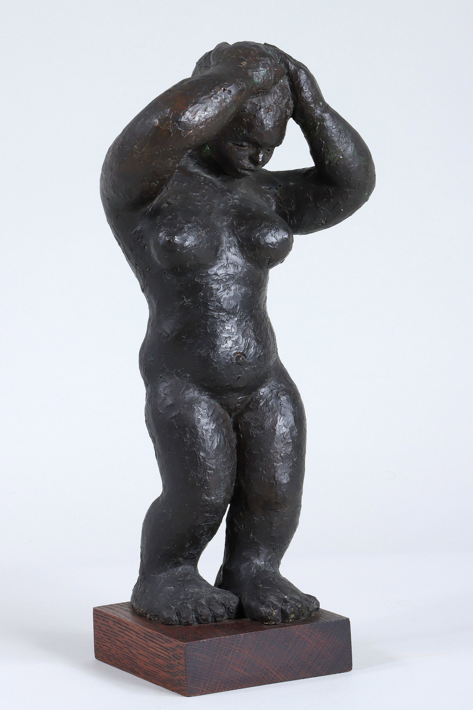 Odilon Duperrier (Haitian, 20th Century): Odilon Duperrier Haitian, 20th Century Female Standing Nude bronze with dark brown patina signed "Odilon" on proper left calf, on walnut stand with artist's name inscribed (mispelled) on adhered label