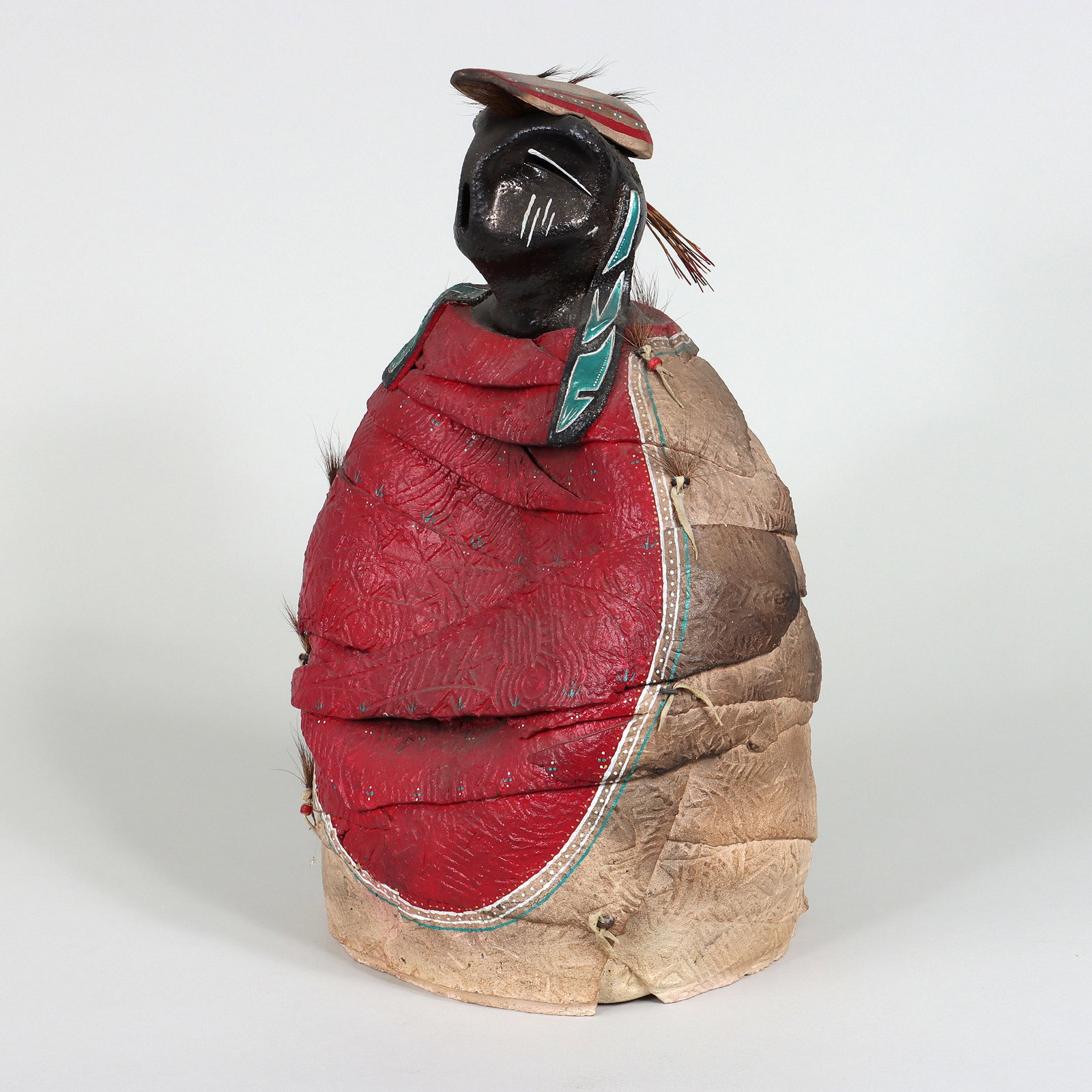 Large Native American Figural Sculpture: Large Native American Painted Pottery Figural Sculpture having applied hair or fur, painted porcupine quills, and knotted leather cord with beads, signed illegibly on back. Height 17 7/8 in. (45.4 cm.