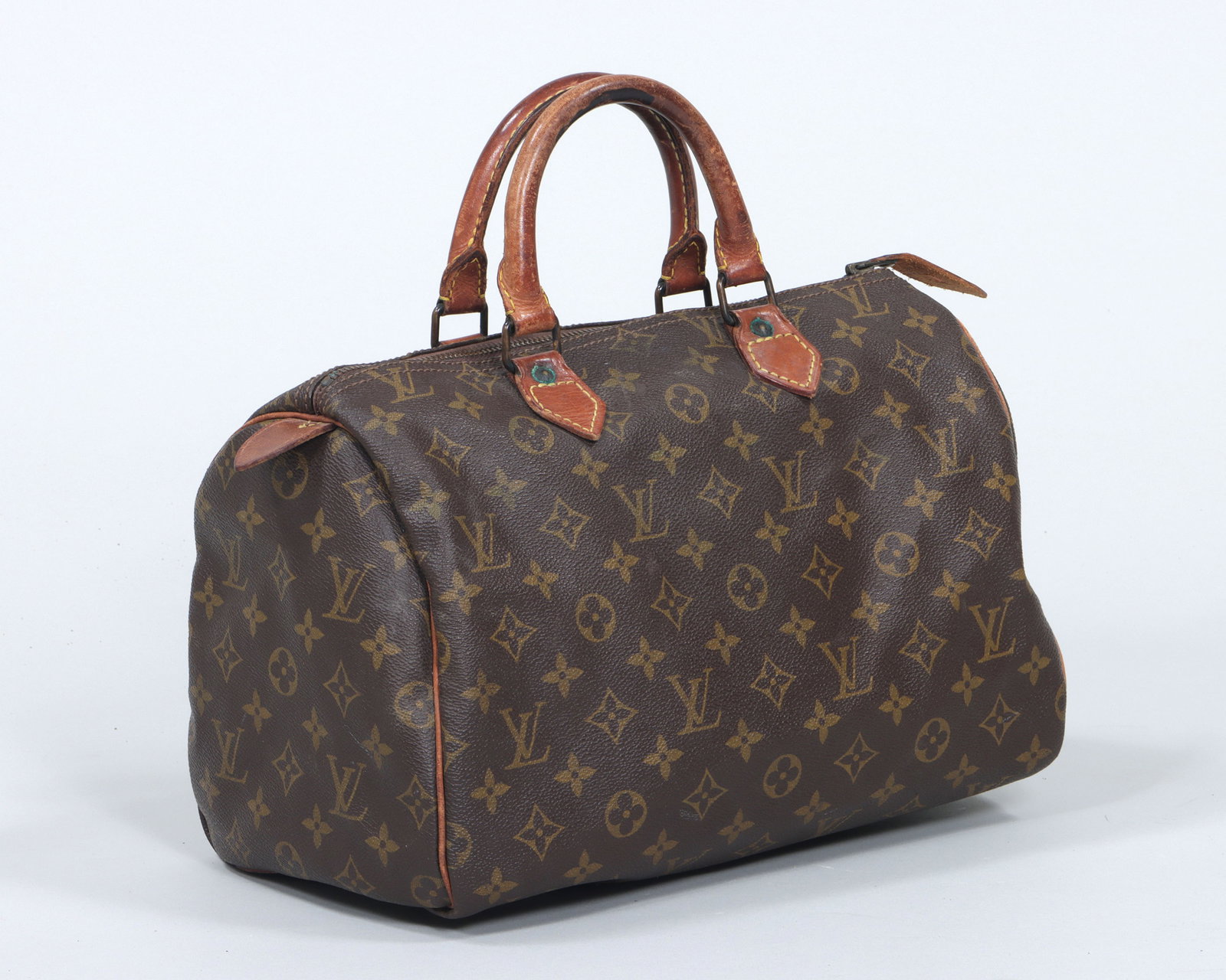 Louis Vuitton "Speedy 30" Handbag: Louis Vuitton "Speedy 30" Handbag with canvas sides in the "Monogram" pattern, leather trim, leather handles, and brass hardware, Paris, France, pre-1980, marked on leather tab at one end and on most 