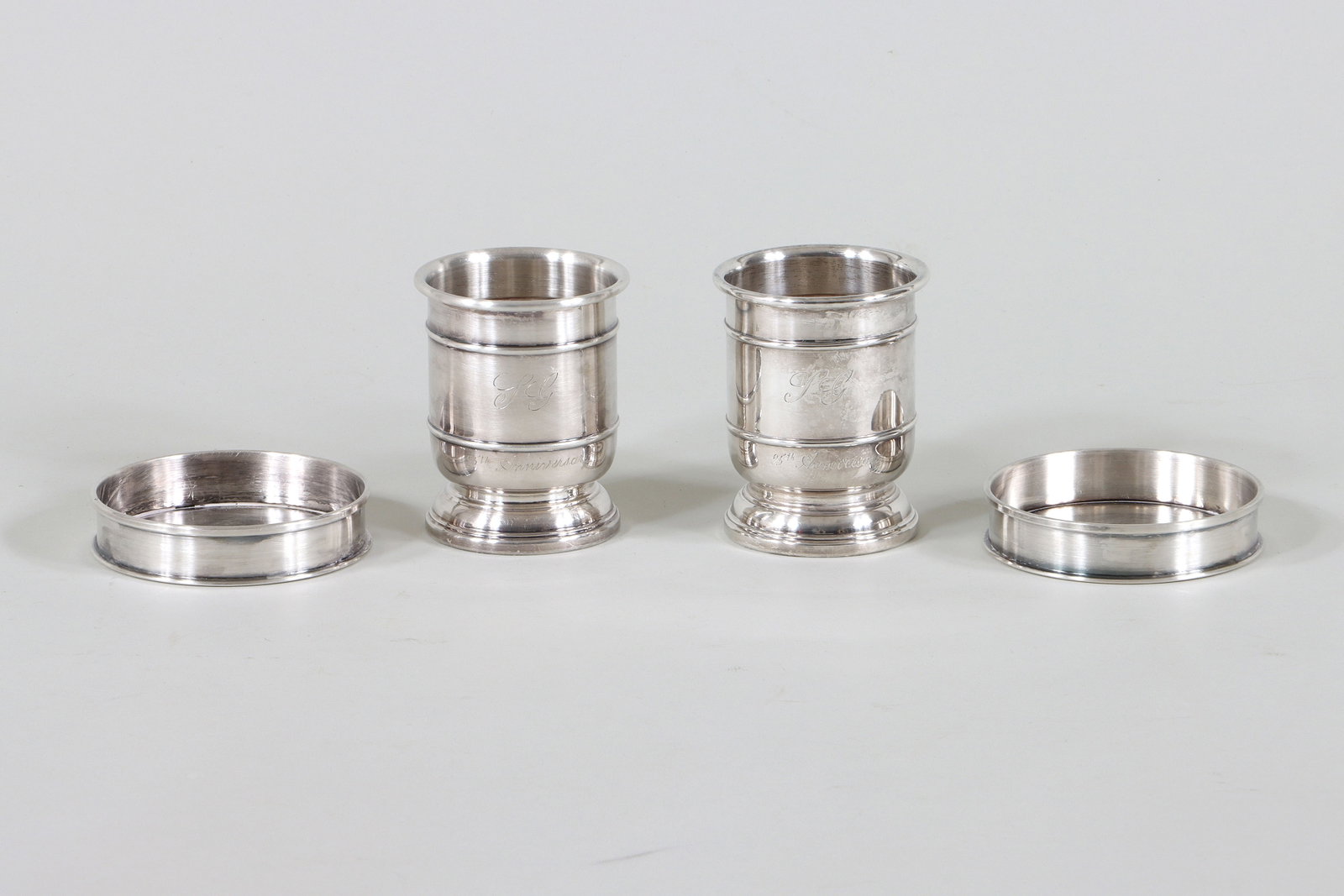 (4) Italian .800 Silver Table Articles: Group of (4) Italian .800 Silver Table Articles to include: pair of footed cups, Florence, sides monogrammed and inscribed "25th Anniversary", bottoms hallmarked with "567 FI" maker's mark; and pair o