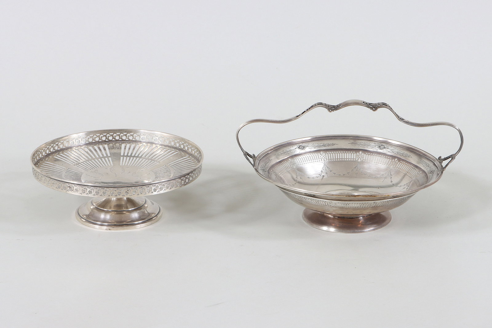 American Sterling Silver Footed Table Articles: Group of (2) American Sterling Silver Footed Table Articles Watson Company, Attleboro, MA, c. 1880-1955 to include: basket with fixed handle, possibly in the Queen Louise pattern, the fixed handle hav
