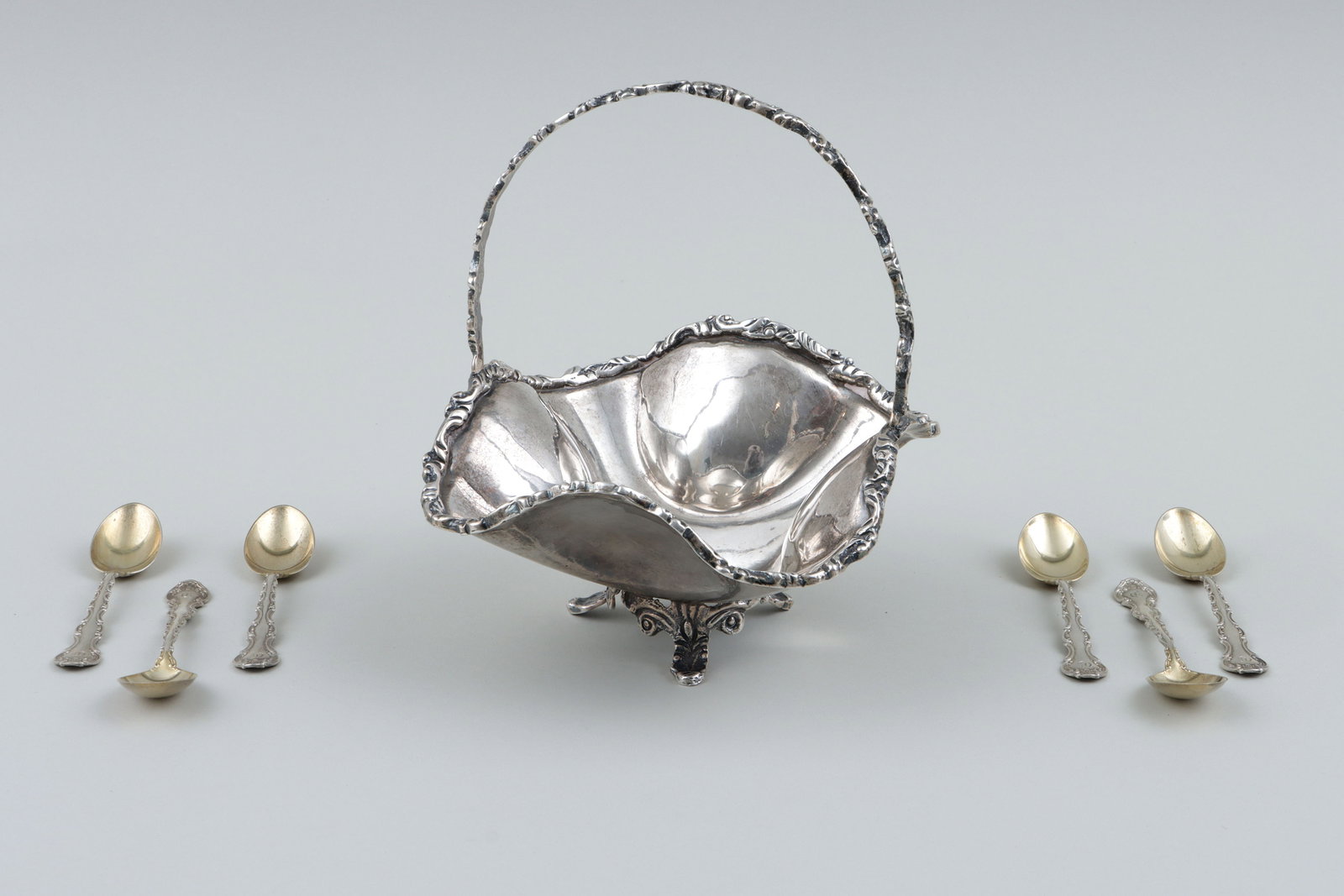 Sterling Silver Items in Scrolled Patterns: Group of (7) Sterling Silver Items in Scrolled Patterns to include: set of (6) Gorham demitasse spoons in the Strasbourg pattern, with gold-washed bowls, marked and monogrammed; and a footed sweetmeat