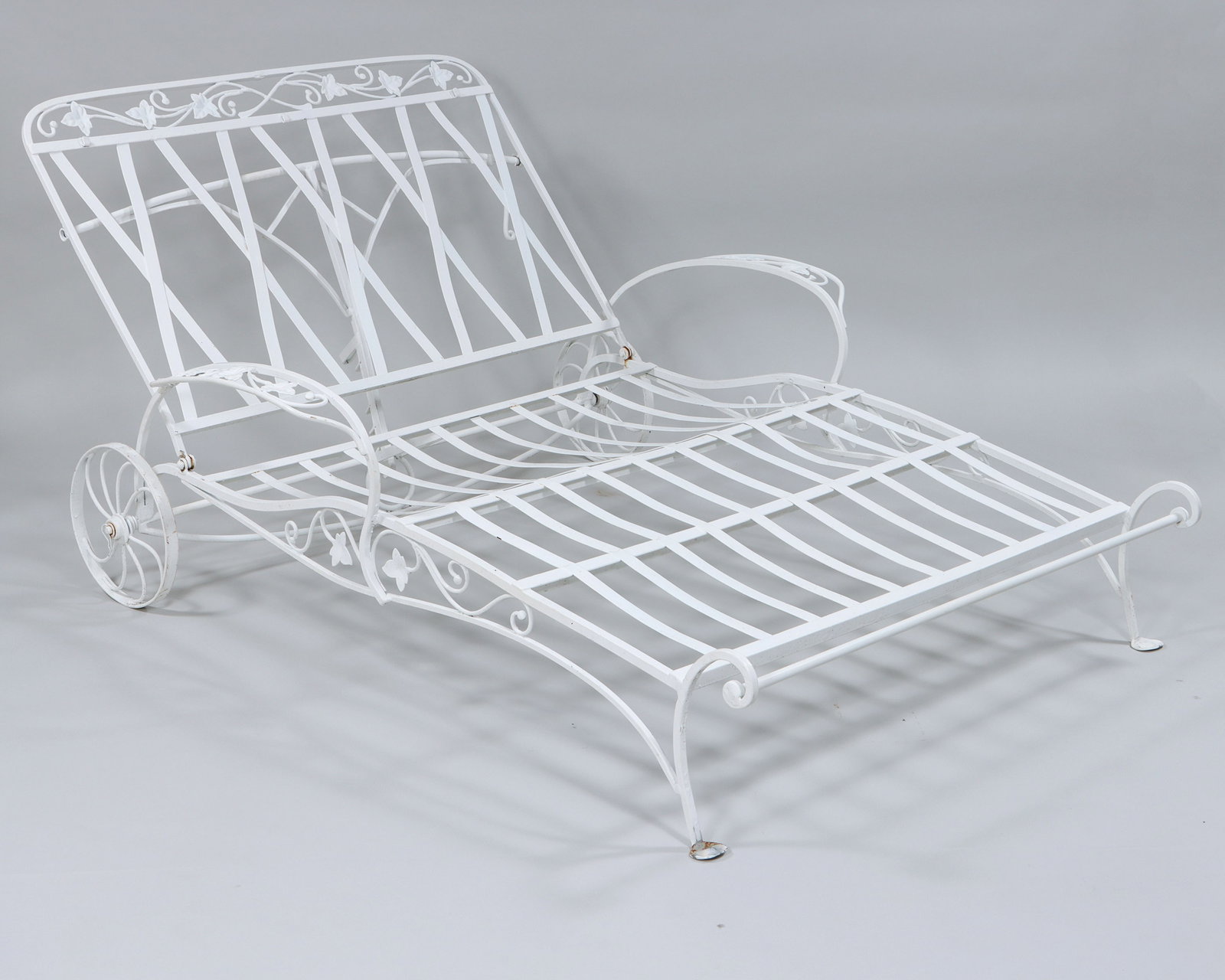 Salterini "Mount Vernon" Double Chaise: Salterini "Mount Vernon" Adjustable Wrought Iron Double Chaise recently painted white, having scrolled ivy leaf designs and strapwork seat support. 35 1/4 (upright) x 52 x 85 (fully reclined) in. (89.