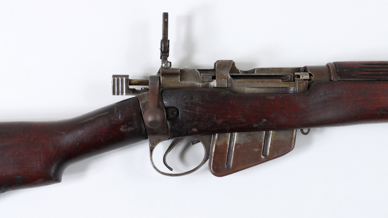 British Lee-Enfield No. 4 Mk I Military Bolt Action: British Lee-Enfield No. 4 Mk I Military Bolt Action in 303 Caliber, WWII, made by Savage Arms The barrel measures 25-1/4" with a 10-round clip. This model was part of the U.S. Lend Lease Act, suppling