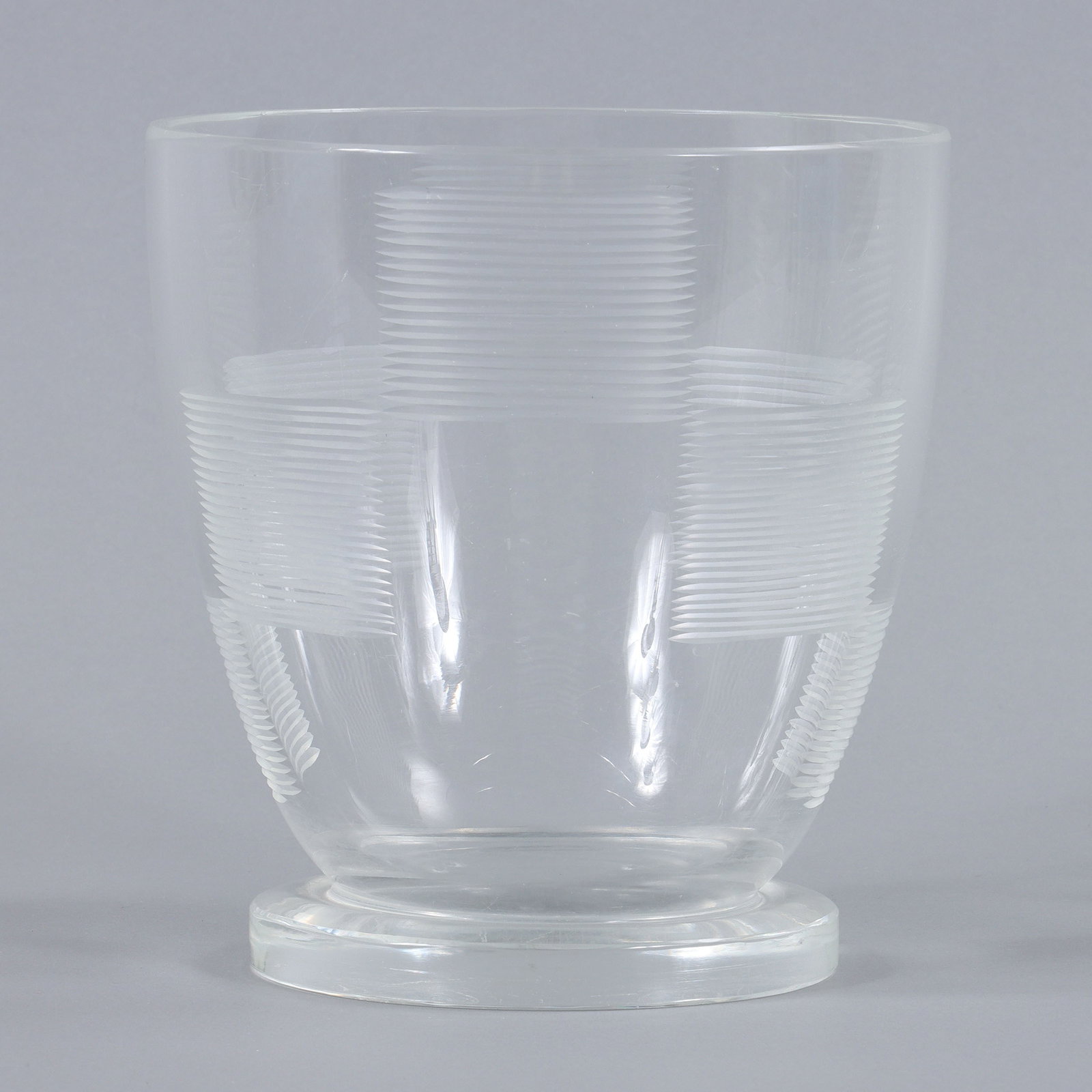 Attr. Walter Dorwin Teague (American, 1883-1960): Attributed to Walter Dorwin Teague (American, 1883-1960) for Steuben, Art Deco Footed Glass Vase with wheel-cut checkerboard design, unmarked. 6 in. x 5 3/4 in. dia. (15.2 cm. x 14.6 cm. dia.)