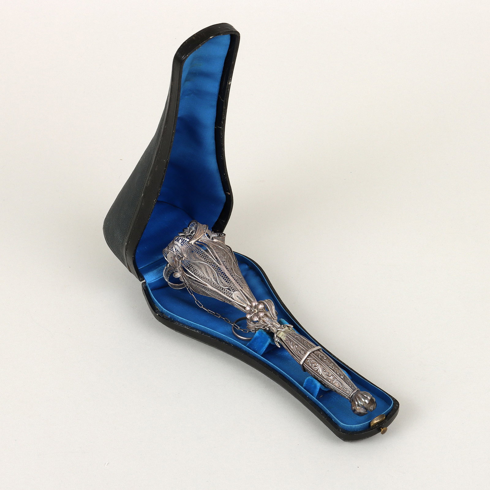 Victorian Silver Filigree Nosegay Holder: Victorian Silver Filigree Bouquet or Nosegay Holder having top in the form of a flower with filigree petals and applied smaller flowers, on tripartite handle with scrolled foliate design, hexagonal ri