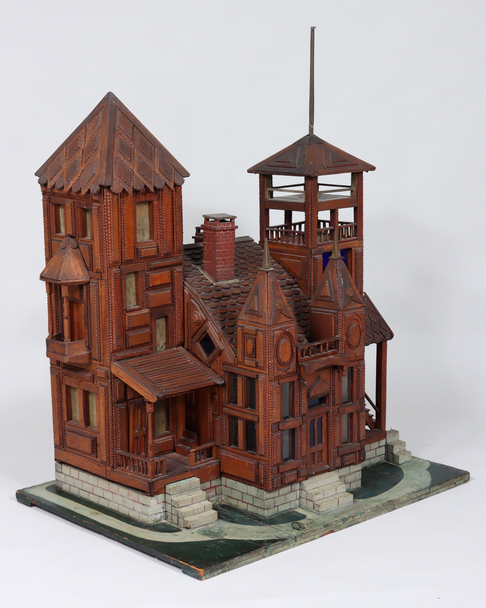 Large Tramp Art House: Large Tramp Art House depicting a Victorian mansion, with hidden drawers and storage areas. 45 (to top of flagpole) x 35 3/4 x 27 in. (114.3 x 90.8 x 68.6 cm.)