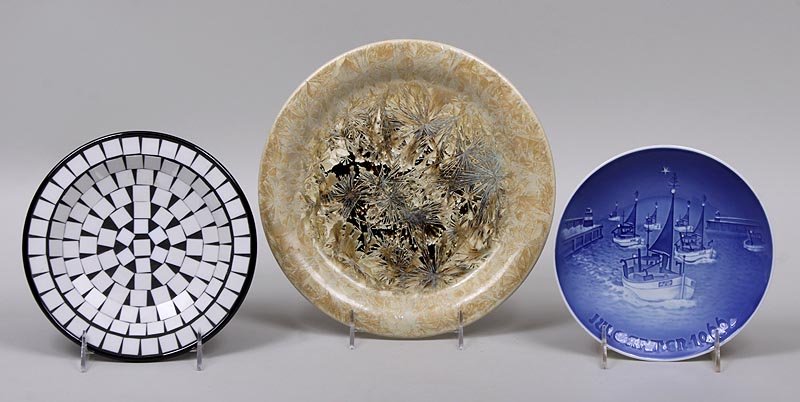 Group of (3) plates: Group of (3) plates to include: pottery organic form with partial mark at bottom, 10-1/4''dia; black and white pottery plate with geometric pattern, marked ''Made in Denmark''; and blue and white boat