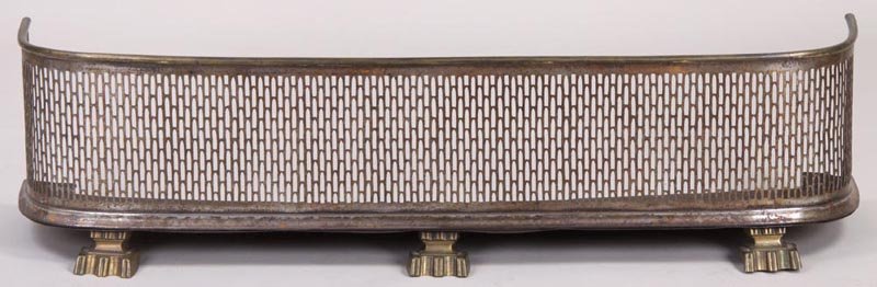 19/20th century fender: 19/20th century brass and metal pierced fireplace fender on paw feet, 8-1/4''h, 39-1/2''l, 10''d.