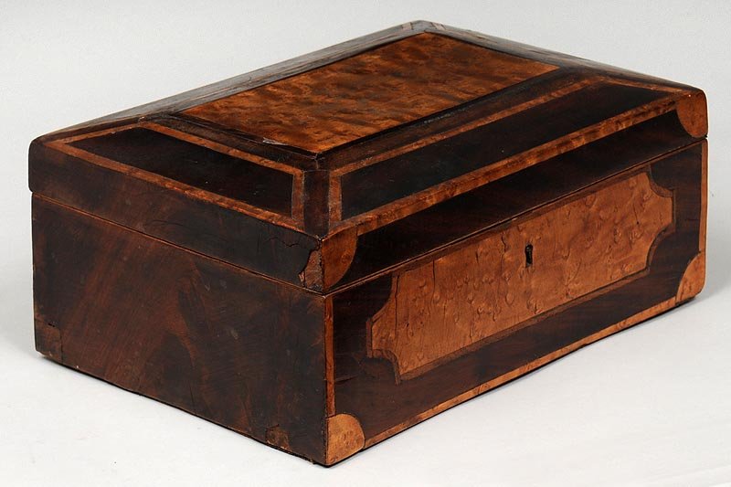 19the century document box: 19the century mahogany and birdseye maple inlaid document box, the raised and paneled lid over a similar inlaid front with escutcheon, 5-1/2''h, 12''w, 8-1/2''w; some small losses and repairs to venee