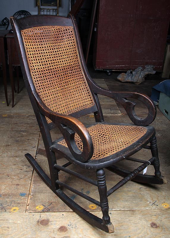 19th century country rocking chair: 19th century country rocking chair with cane seat and back, 41''h; seat needs repair.