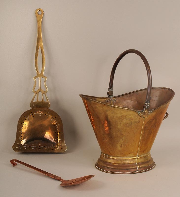 Brass lot: Brass lot (3): Ash bucket (11-1/2''h, 14-1/2''w), warmer, and strainer.