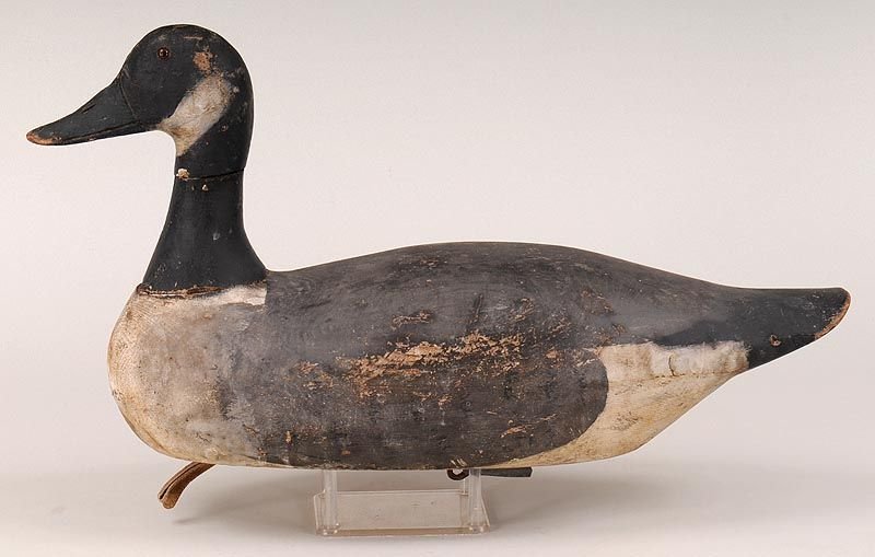 Dodge goose in original paint with some with some early: Dodge goose in original paint with some with some early touch up and neck repair. One glass eye and inlaid lead ballast weight missing. Shows in use wear. Provenance: Charles Banks Belt collection.