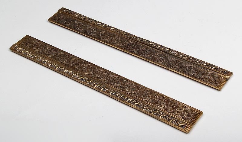 Tiffany Studios bronze blotter ends with Venetian: Tiffany Studios bronze blotter ends with Venetian pattern, marked ''TIFFANY STUDIOS, NEW YORK, 1696'' to bottom, each 19-1/4''h, 2-1/2''w, 3/4''d.