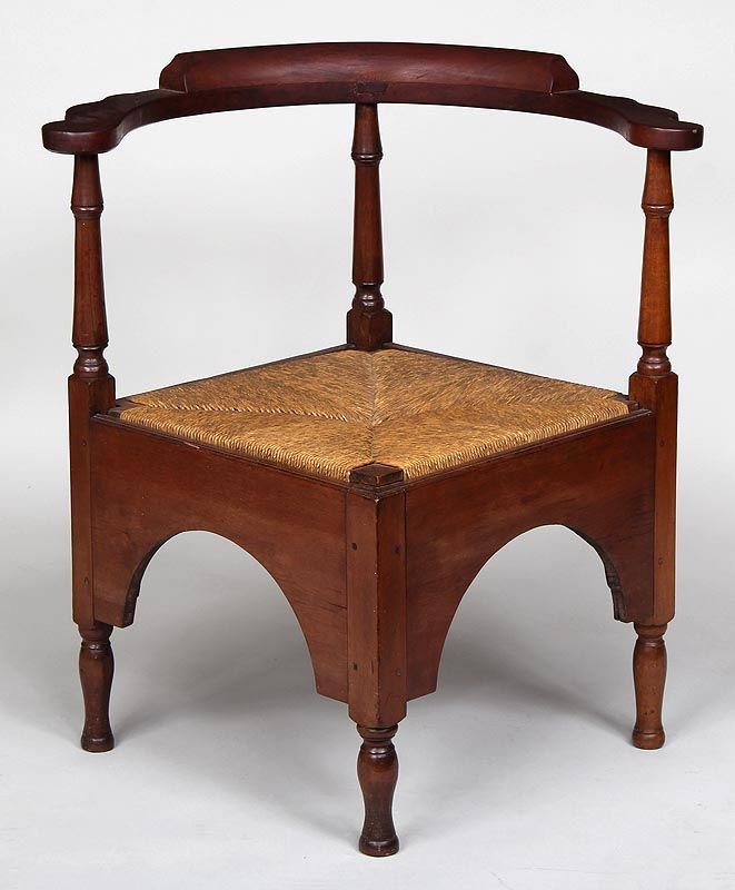 American cherry corner chair with arched skirt, 30''h,: American cherry corner chair with arched skirt, 30''h, 28''w, 27''d.