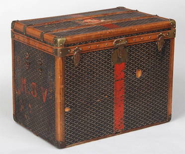 Goyard travel trunk, 22''h, 27-1/2''w, 18''d; wear,: Goyard travel trunk, 22''h, 27-1/2''w, 18''d; wear, loss to surface, handles damaged.