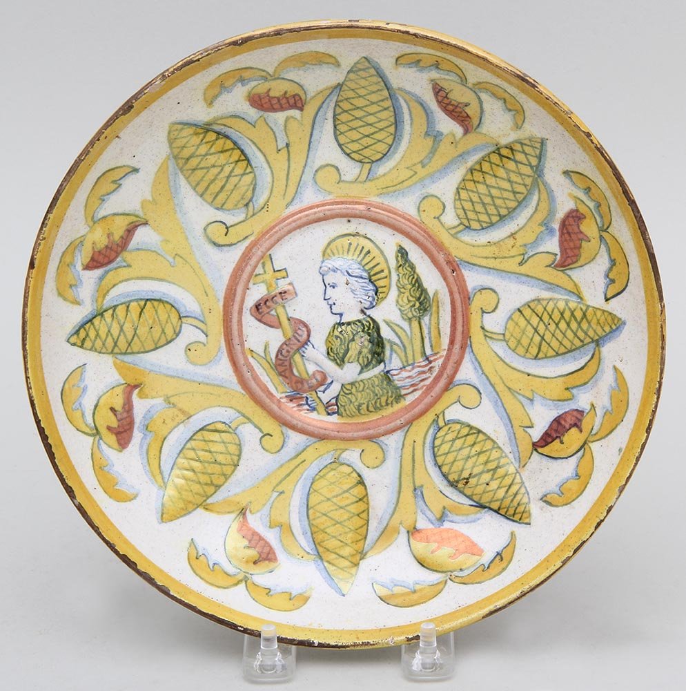 Italian Faience plate with saint bearing cross marked: Italian Faience plate with saint bearing cross marked ''Ecce Agnius Die'', 8-3/4''dia, 2''h; minor losses. Provenance: Long Island estate of an art historian and collector.