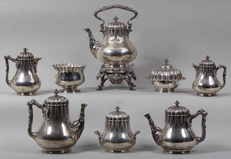 Grosjean & Woodward for Tiffany & Co eight piece: Grosjean & Woodward for Tiffany & Co eight piece sterling silver tea service, having vine handles, mythological heads, and figural feet to warming stand, comprising hinged handle teapot on warming sta