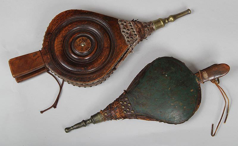 Group of (2) wood and leather bellows with brass: Group of (2) wood and leather bellows with brass fittings, one with painted decoration, larger 20''l, 8-1/4'' w, 2-1/2''d, both show significant wear from use.