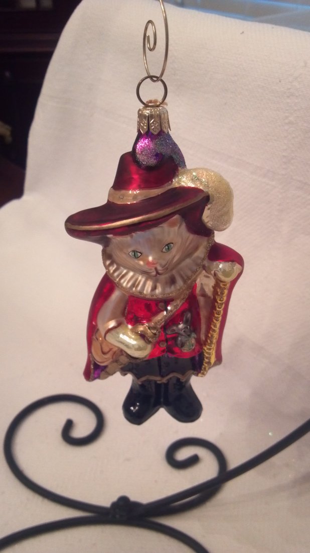 Christopher Radko Ornament "Puss In Boots": Christopher Radko ornaments are designed by a team of artists and craftsmen using Renaissance-era glass blowing, molding, silver lining, hand painting and finishing processes that require unparalleled