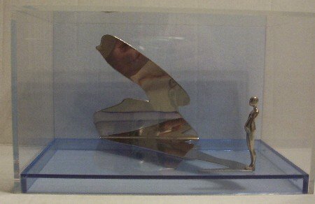 Ernest Trova: (American, 1927 - ) Sculptu: ARTIST: Ernest Trova TITLE: Shadow MEDIUM: Chrome and Lucite SIGNATURE:Signed EDITION: 6/150 DATE: 1971 SIZE: 7" X 11 1/4" x 7 1/2"