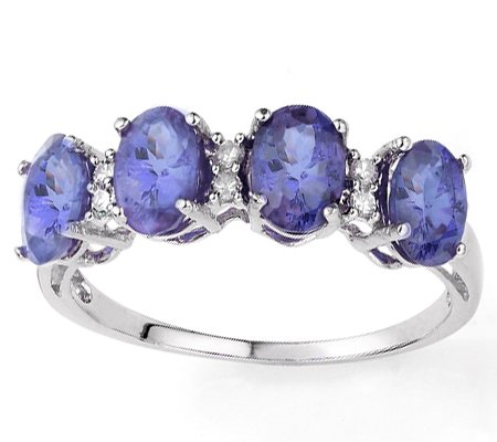 NATURAL TANZANITE & 6 PCS DIAMOND 10K GOLD RING: This gorgeous ring features 4 oval tanzanite stones, each 4X6mm for Total carat weight 1.63 carats of gemstones. Their vibrant color will add a stunning amount of sophistication to your finger wheneve