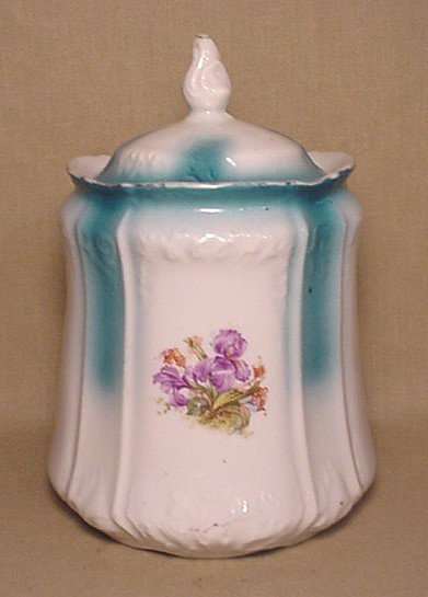 Old china jar with purple flower design