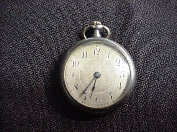 Silver case miniature watch