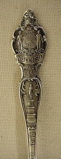 Wisconsin sterling souvenir spoon: Wisconsin sterling souvenir spoon Spoon is 5 7/8" long and made by Wallace silver co.