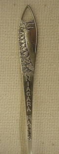 Niagara Falls sterling souvenir spoon: Niagara Falls sterling souvenir spoon Spoon is 5 3/8" long with cut design of falls