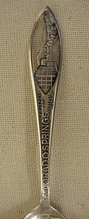 Colorado Springs sterling souvenir spoon: Colorado Springs sterling souvenir spoon Spoon is 5 1/2" long with cut design on handle made by "Johnson Jewelry Co"