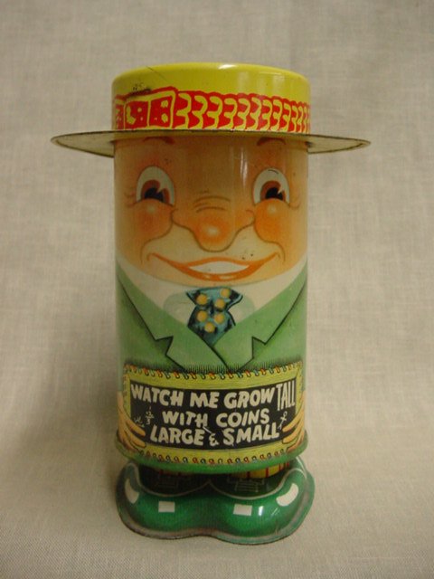 Apex Novelty "Growing Leg" tin bank