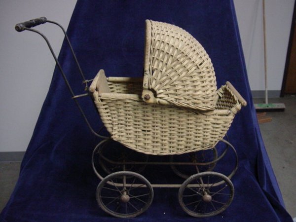 Old wicker doll buggy